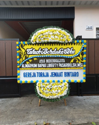 Papan Bunga Duka di Kamal